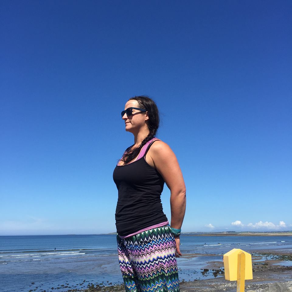 Woman standing on the beach