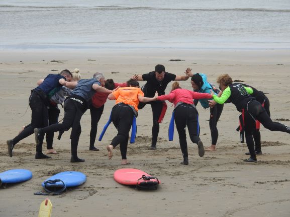 Yoga exercises on the beach