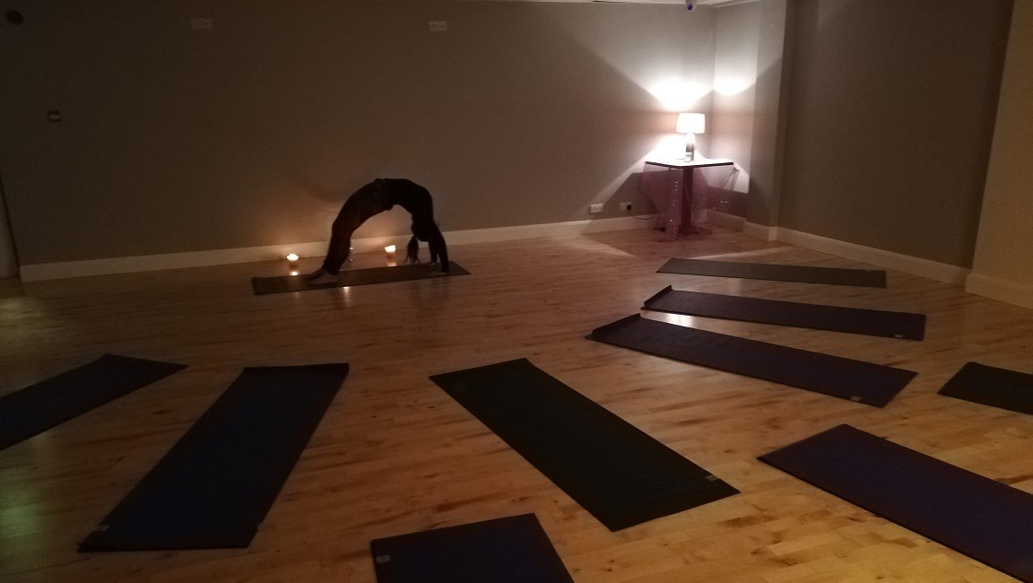Woman practicing yoga in the studio