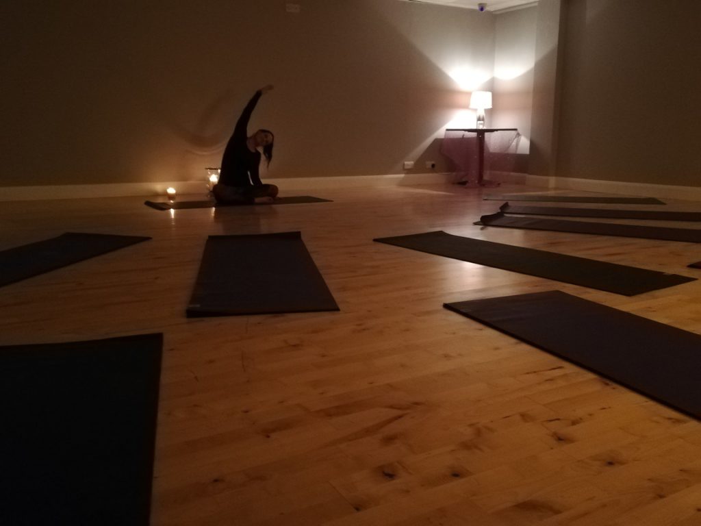 Woman practicing yoga in the studio
